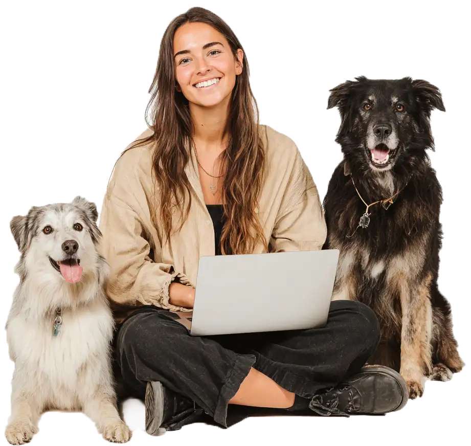 Frau mit Hunden und Laptop